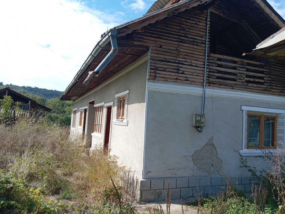 Casa de vânzare și teren