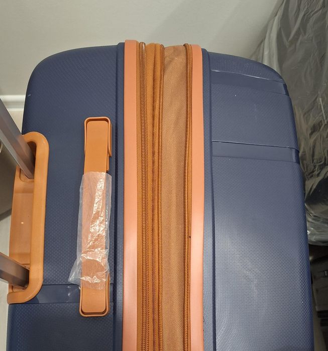 Чемодан с расширением