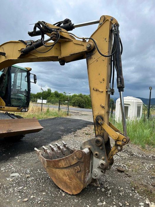 Excavator pe roti CAT M313D