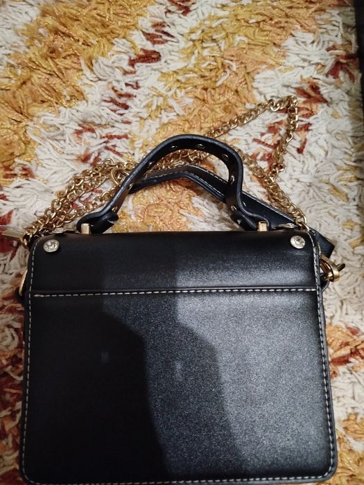 Женская сумка  с клёпками