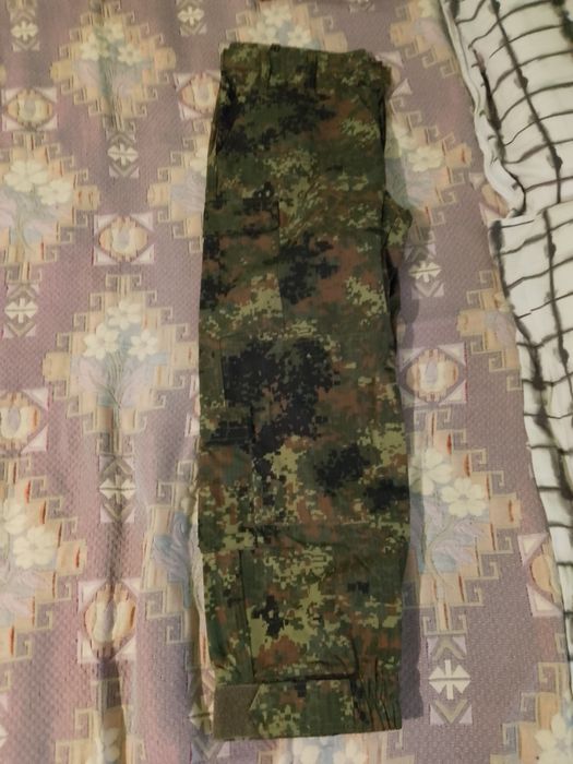 Камуфлажна шуба.