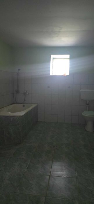 Casă bătrânească trainică din piatră, 4500 mp teren,pomi fructiferi  ,la doar 20 min de Mangalia