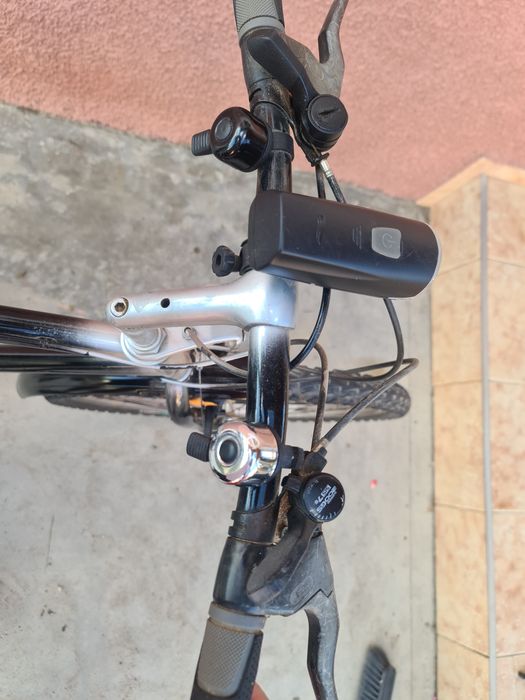 Bicicleta  adaptata mixt (mountain bike si clasic)
