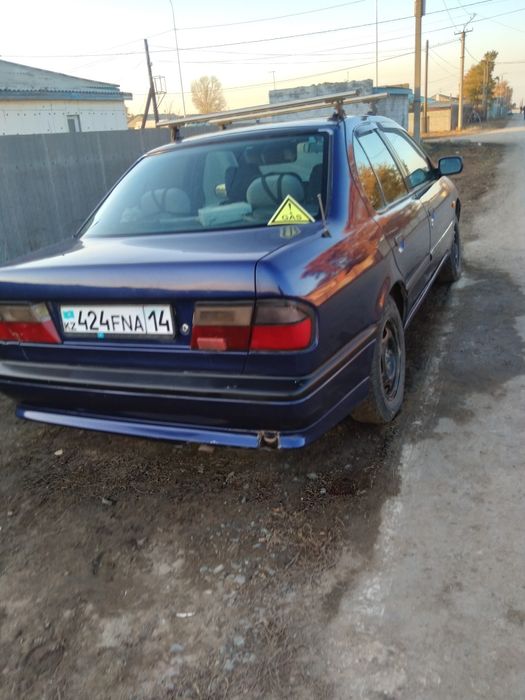 Автомобиль Ниссан примера п10