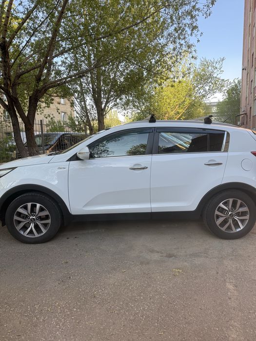 Kia sportage 2014 год