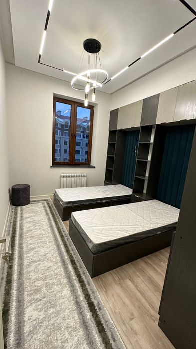 Новостройка ЖК " Poytaxt gavhari" 3/6/9 С ремонтом и обстановкой 100м²