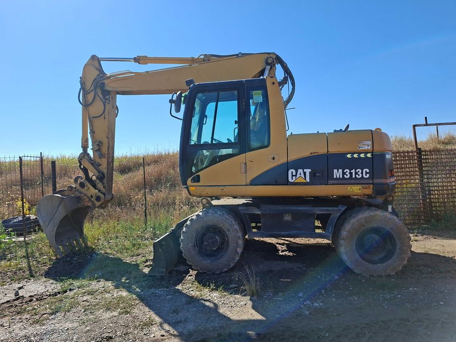 Excavator pe roti CAT 313M