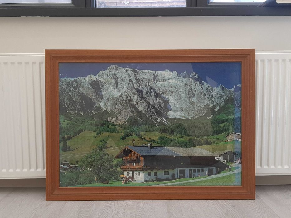 Собранный пазл, оформленный в рамку