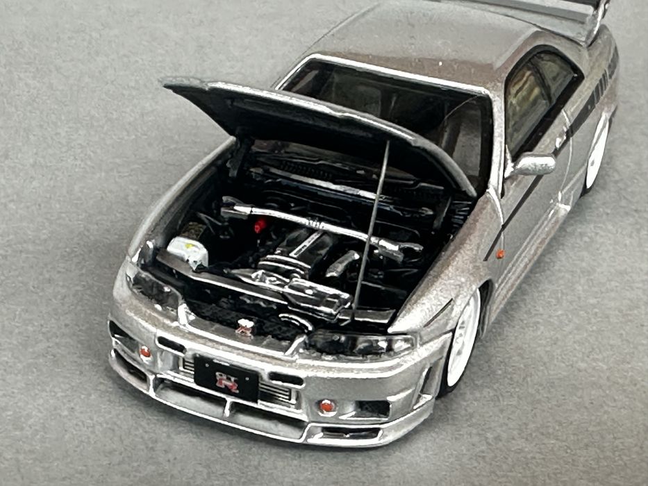 Macheta 1:64 Nissan R33 Nismo GTR ( nu tarmac hot wheels )