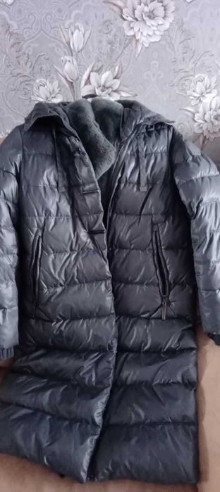 Продам пуховик женский б/у