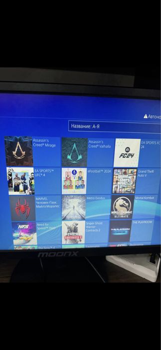 Продам playstation4 slim 1TB 2джестик и игры на борту как на фото