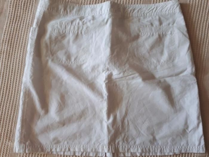 Белая мини-юбка,