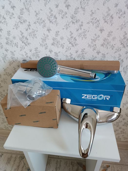 Продам новый смеситель на ванну