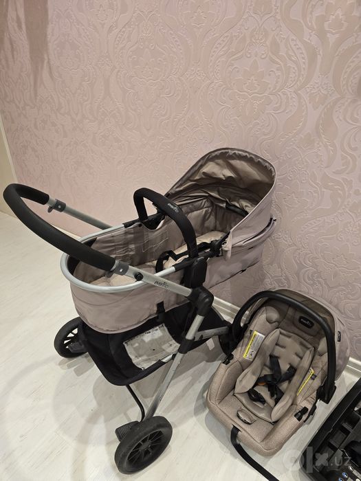 Классная коляска 3 в 1 Evenflo Pivot Travel System + автокресло