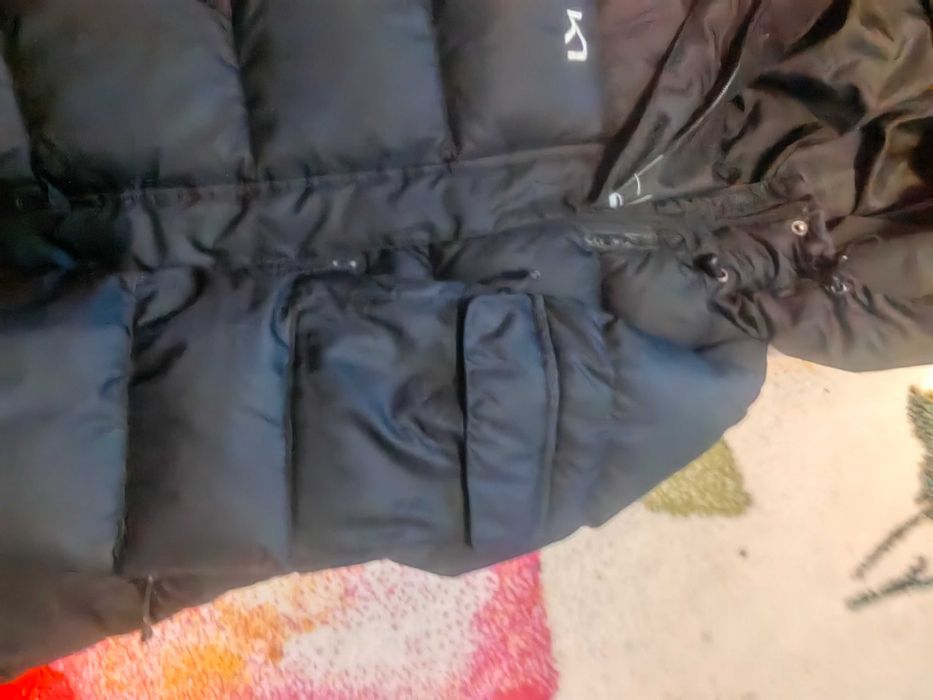 Топло дамско/юношеско яке на марката К7, с пълнеж от пух.