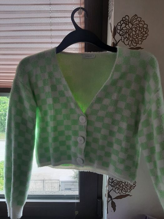 Къса дамска жилетка