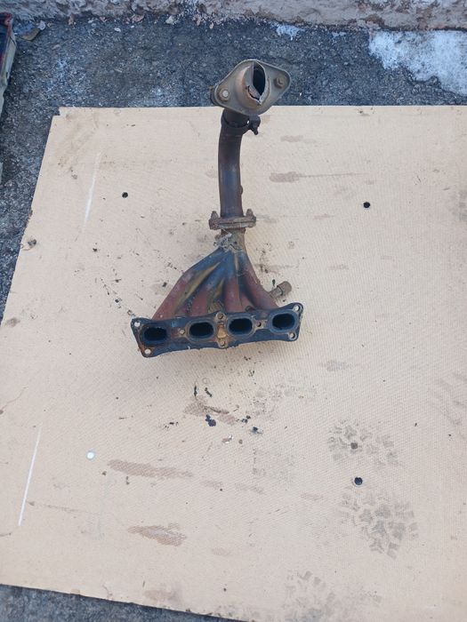 Коллектор Мазда 323 двигатель ZL
