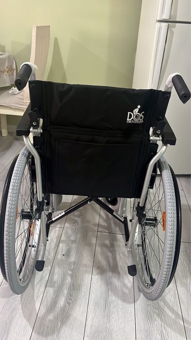 Инвалидная коляска