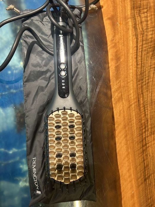 Четка за изправяне на коса