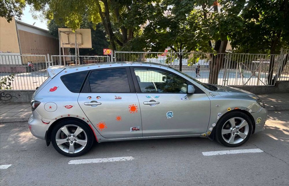 Автомобил Мазда 3