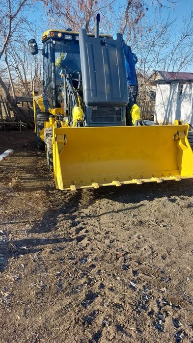 Продам экскаватор погрузчик 3 в 1