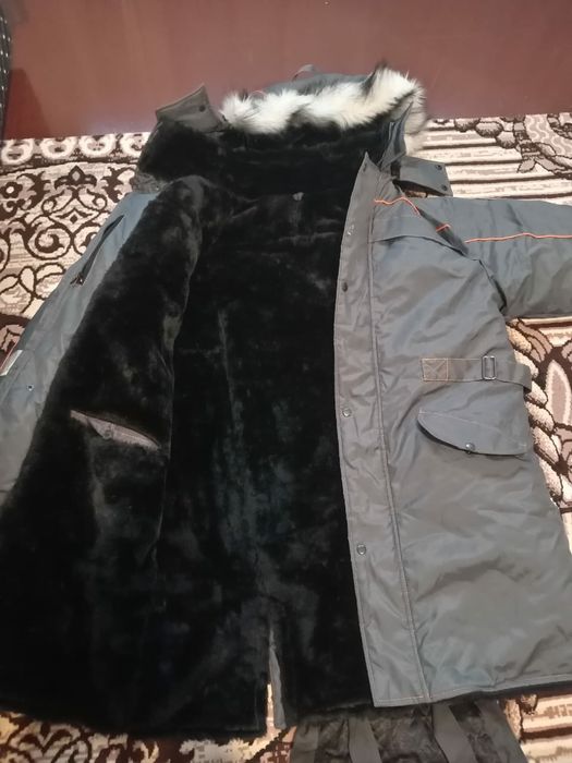 Продам зимний пуховик