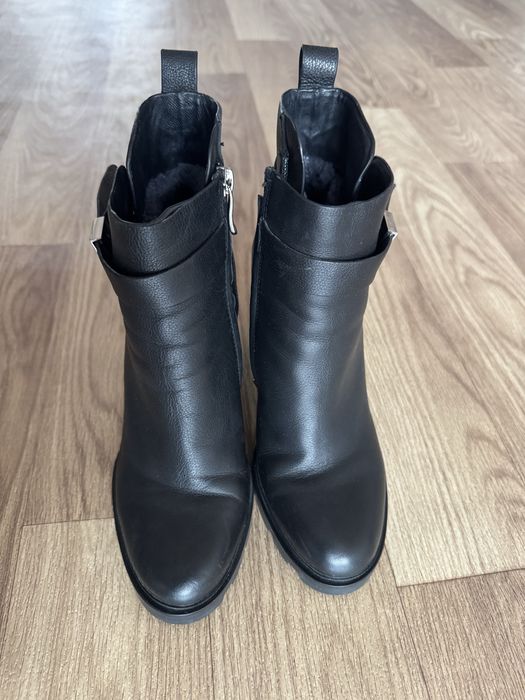 Зимние сапоги на каблуках