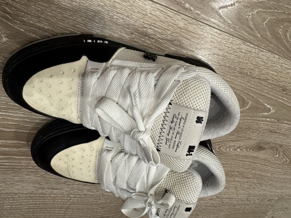 Amiri ma 1 black and white