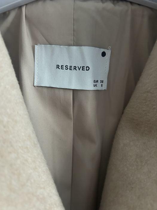 Palton crem reserved