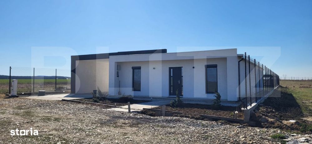 Casa individuala Osorhei cu filigorie si gard imprejmuire