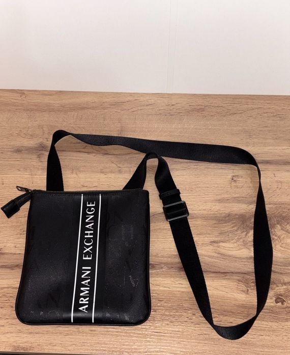 Барсетки Guess,Armani Exchange