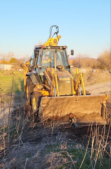 Услуги с комбиниран багер.