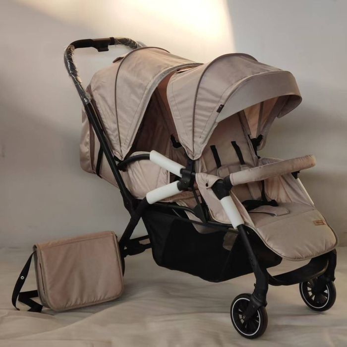 Коляска для двойняшки эгизаклар учун