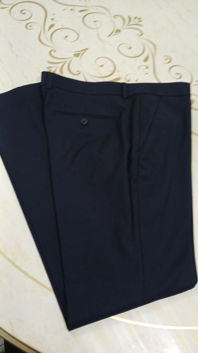 Продам костюм тёмно синего цвета