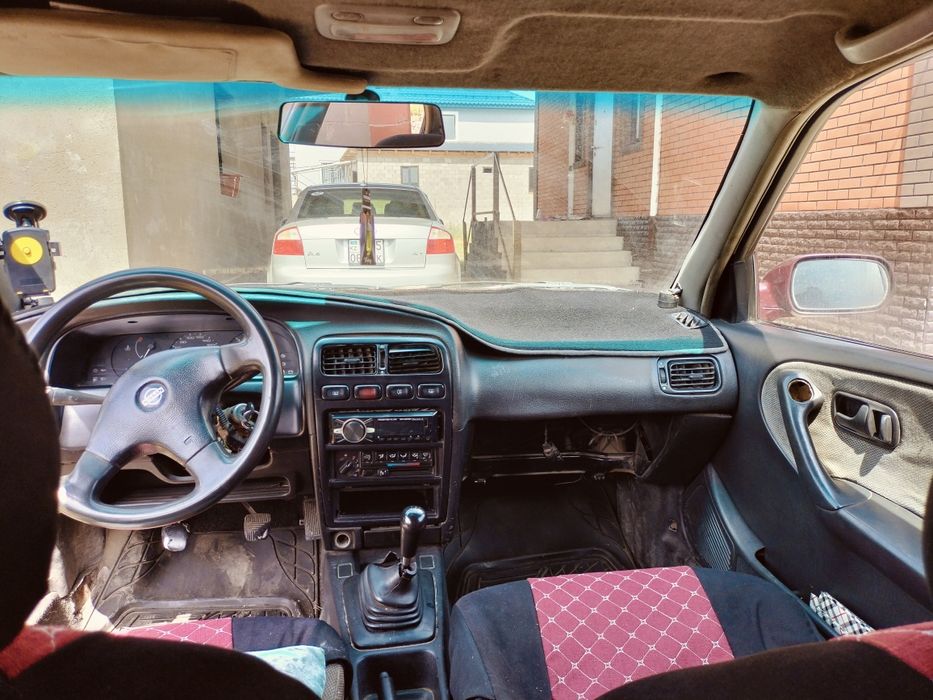 Ниссан  примера 1.6