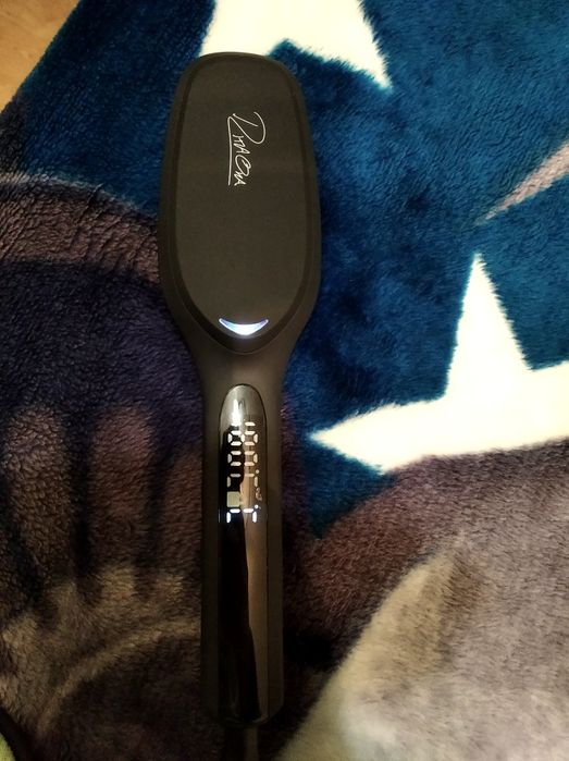 Четка за изправяне на коса