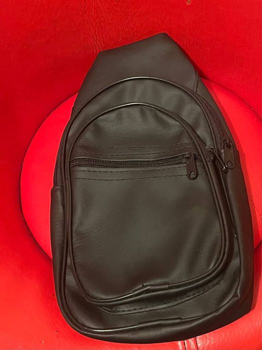 Барсетки кожаные