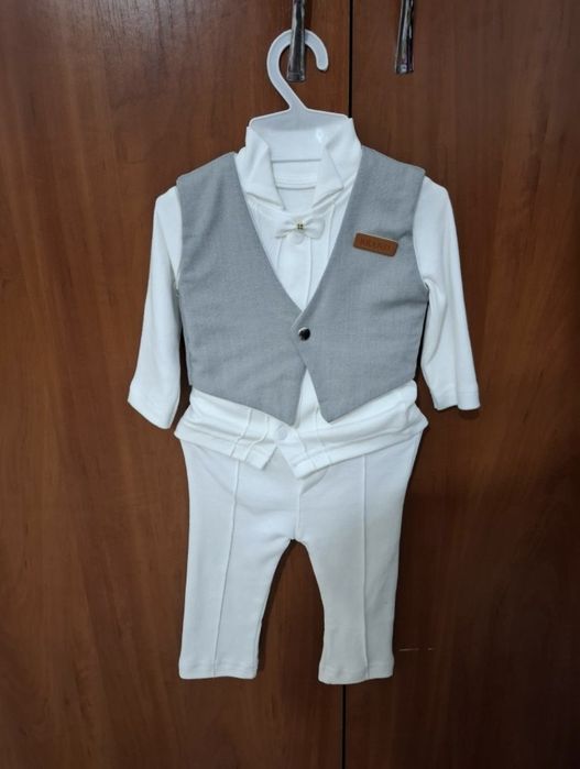 Новый костюмчик отдам