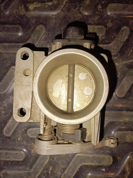 Дроссельная заслонка