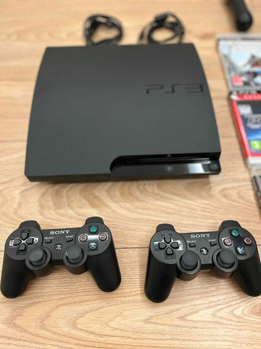 PlayStation 3  / 2 Manete / 13 Jocuri / 2 controllere Move + starter disc