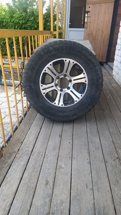 Диск с резиной на prado