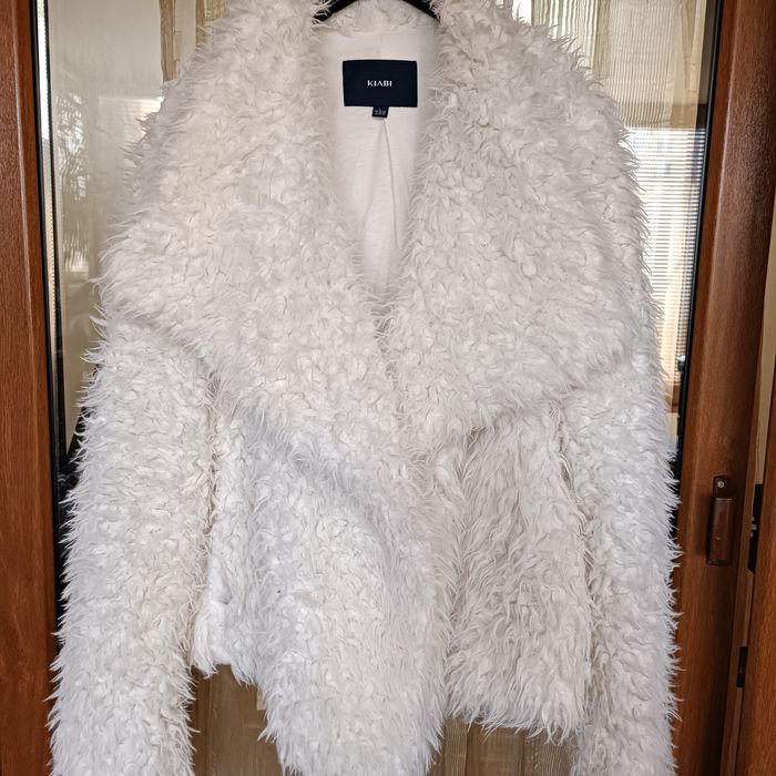 Пухкаво палтенце