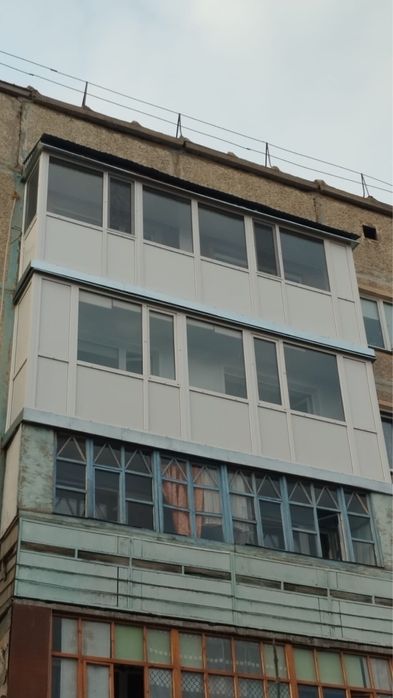 Балконы с обшивкой