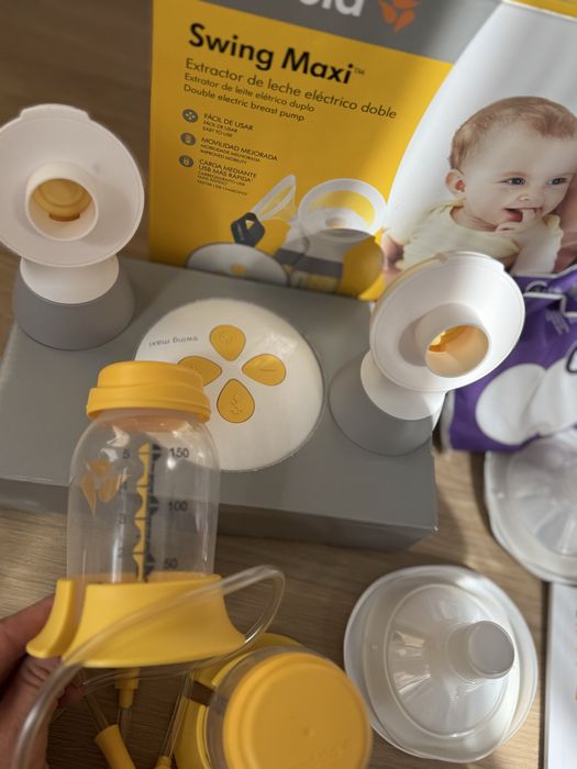 Двойна електрическа двуфазна помпа за кърма Medela - Swing Maxi