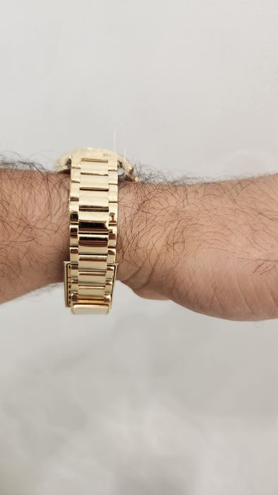 Женские золотые часы Rolex.