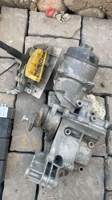 Запчасть на BMW  Масленный стакан,селектр акпп