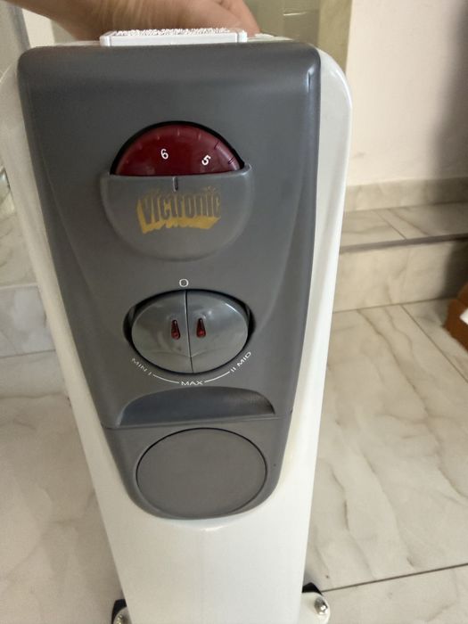 Titlu: Calorifer electric cu ulei Victronic OFR-7, 1500W, 7 elemenți