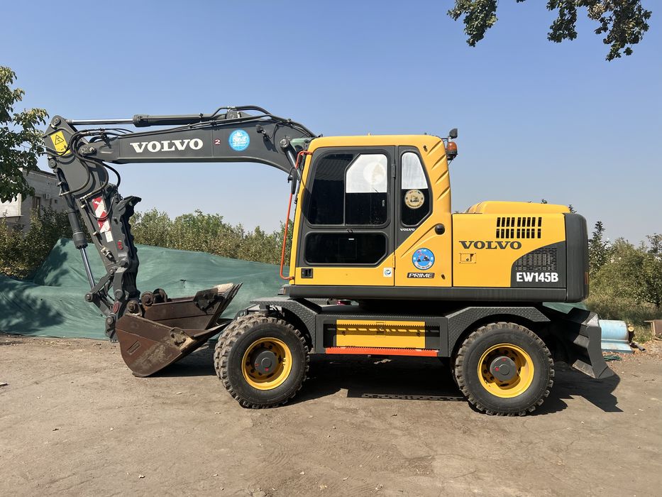 Экскаватор хизмати