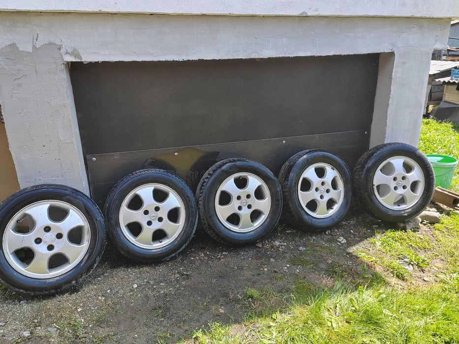 5 jante aluminiu opel astra cu tot cu anvelope si prezoane conice
