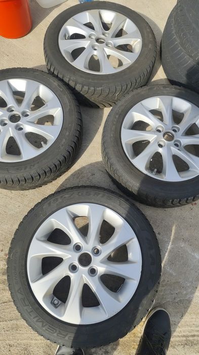 Jante aluminiu 4 X100 pe 15. Cu anvelope M+S . 185/55R15.